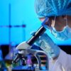 examining-sample-with-microscope examining-sample-with-microscope